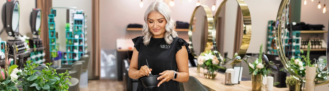 woman mixing hair solutions
