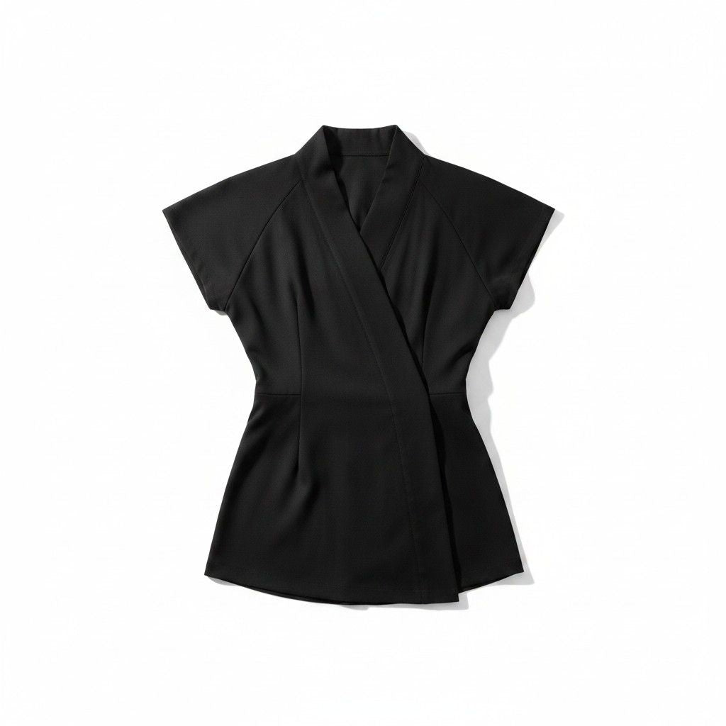 SOHO Wrap top in black bleach-resistant fabric, flat lay