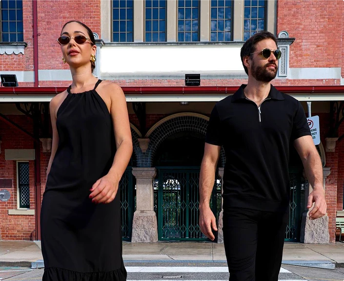 man and woman wearing savvy industry clothing