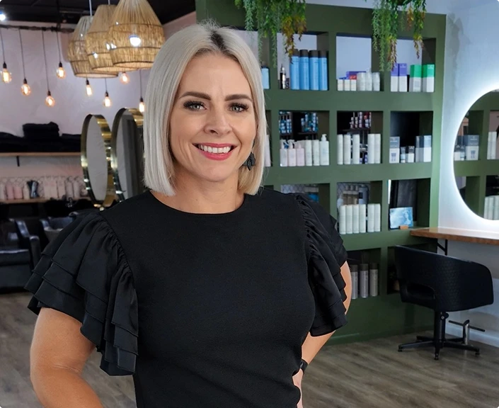 salon owner wearing savvy industry clothing