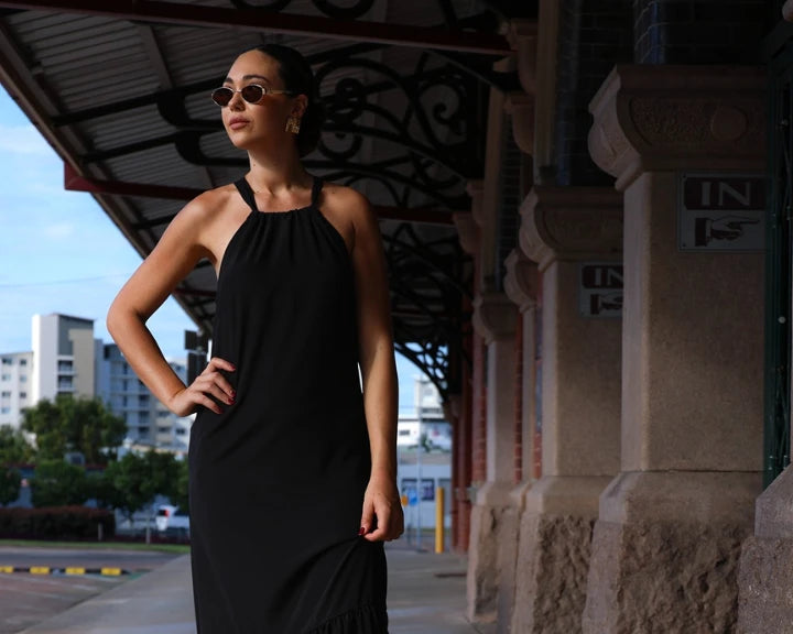woman posing wearing savvy industry clothing